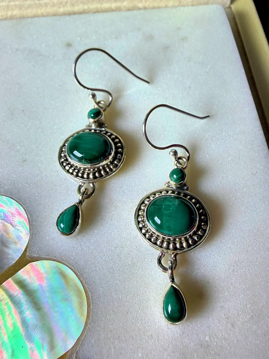 Close view of the banded malachite and oxidised silver beadwork