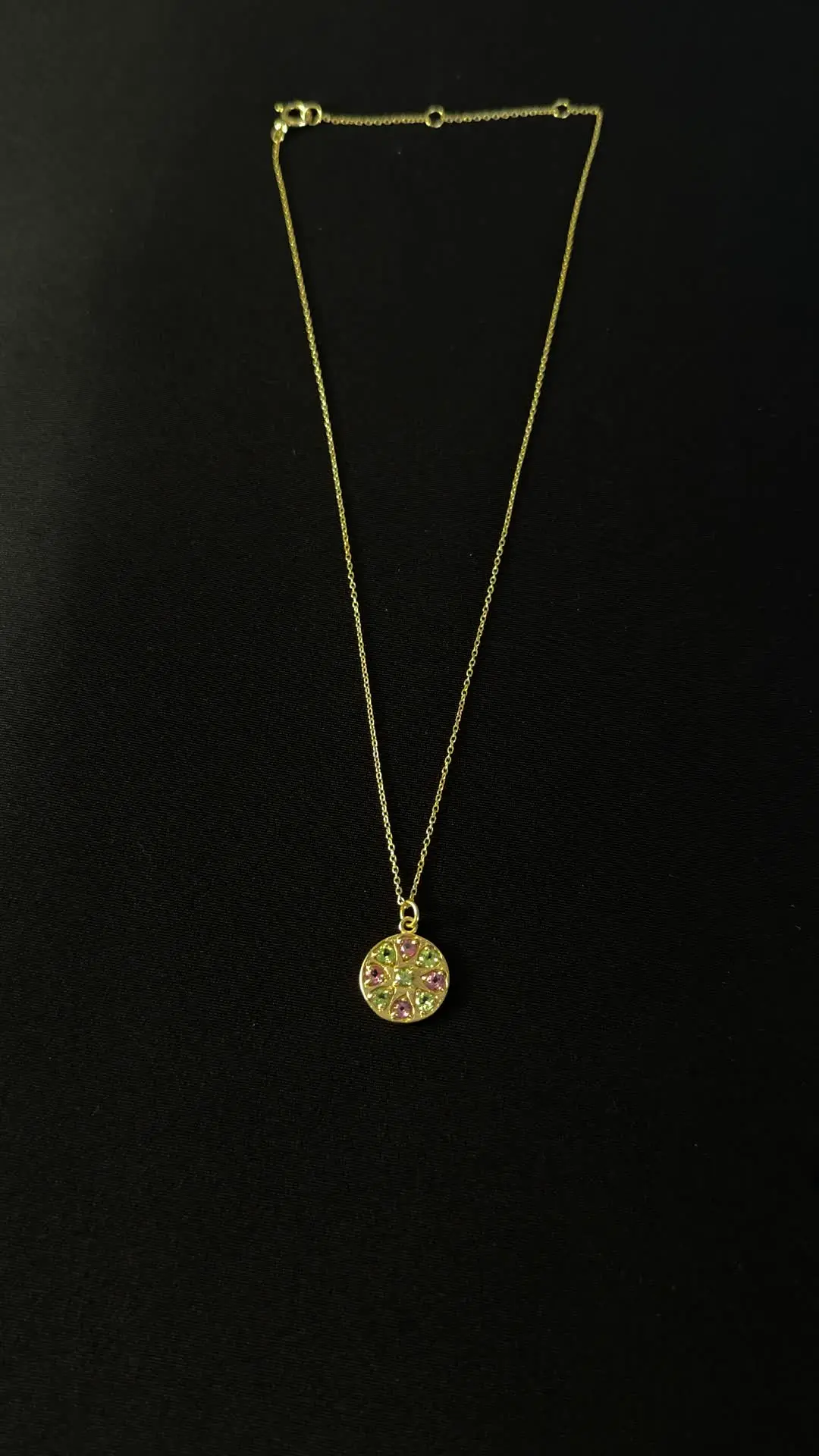 Chakra gemstone disc pendant, full chain visible