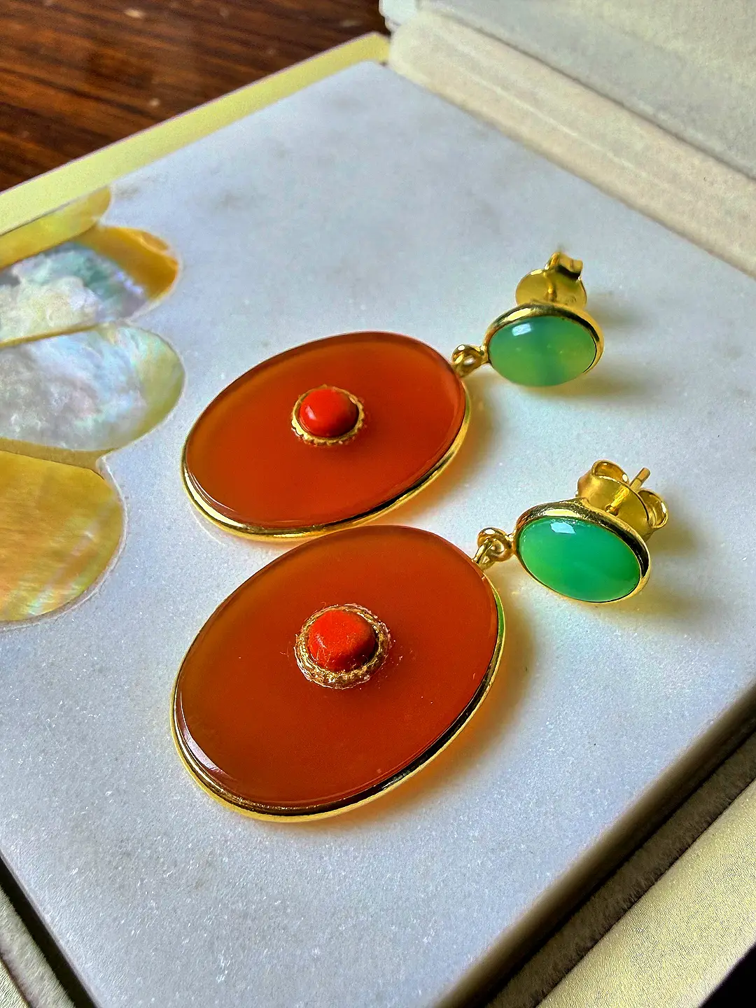 Close view of the Gulmohar carnelian discs and their granulated coral centres