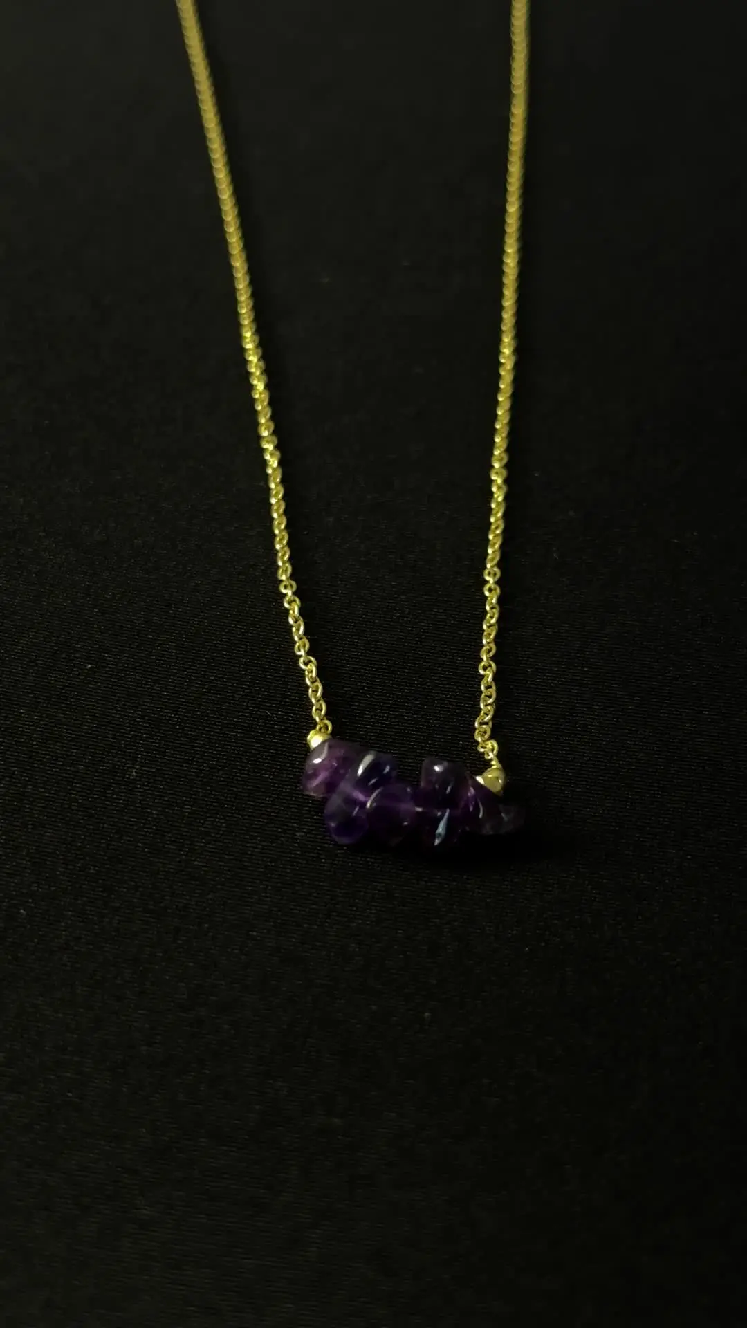 Nadi necklace — raw amethyst chips gathered on a fine gold chain