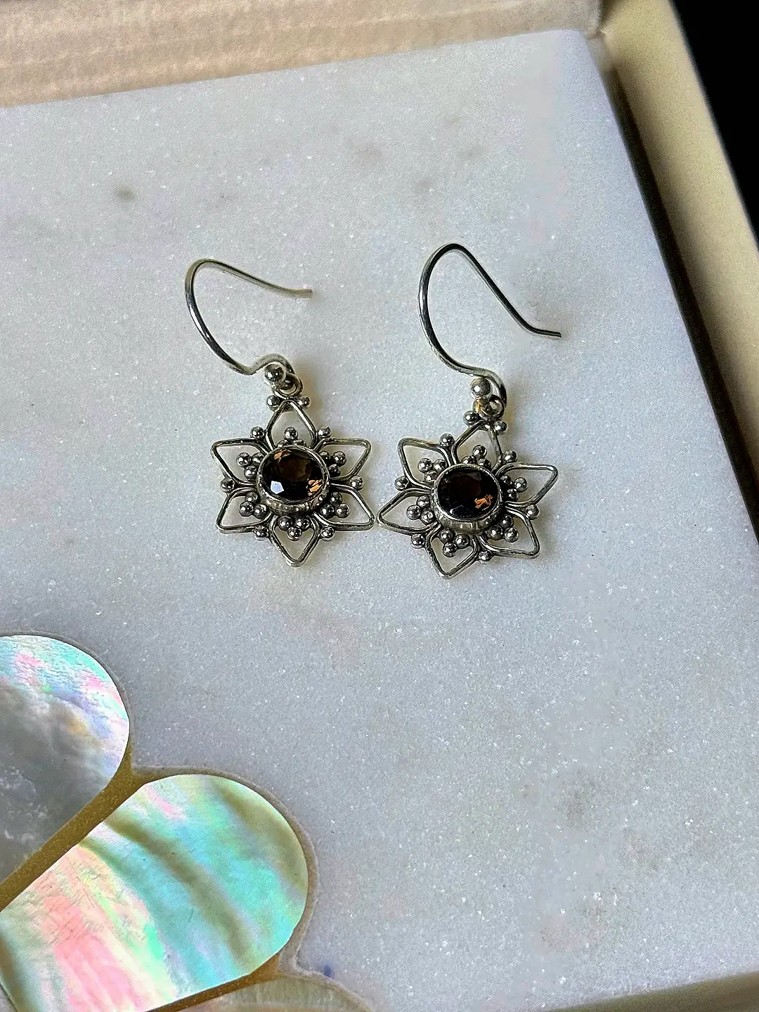 Tara star drop earrings in their Silvorious gift box